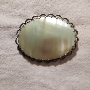 Luminous Cream Mother-of-Pearl Oval Brooch with Silver-Tone Frame